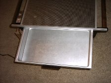 This full size hot plate has a warming drawer.